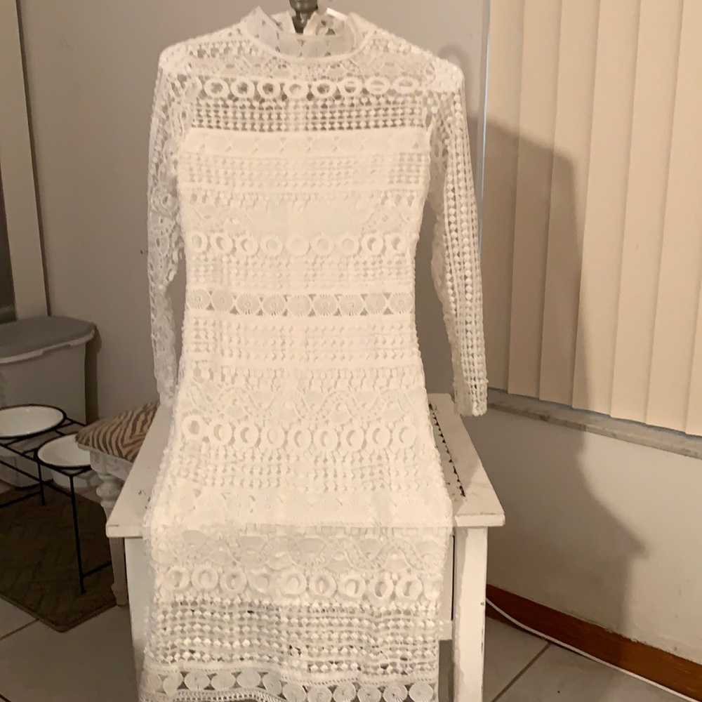 Beautiful lace dress size small never worn